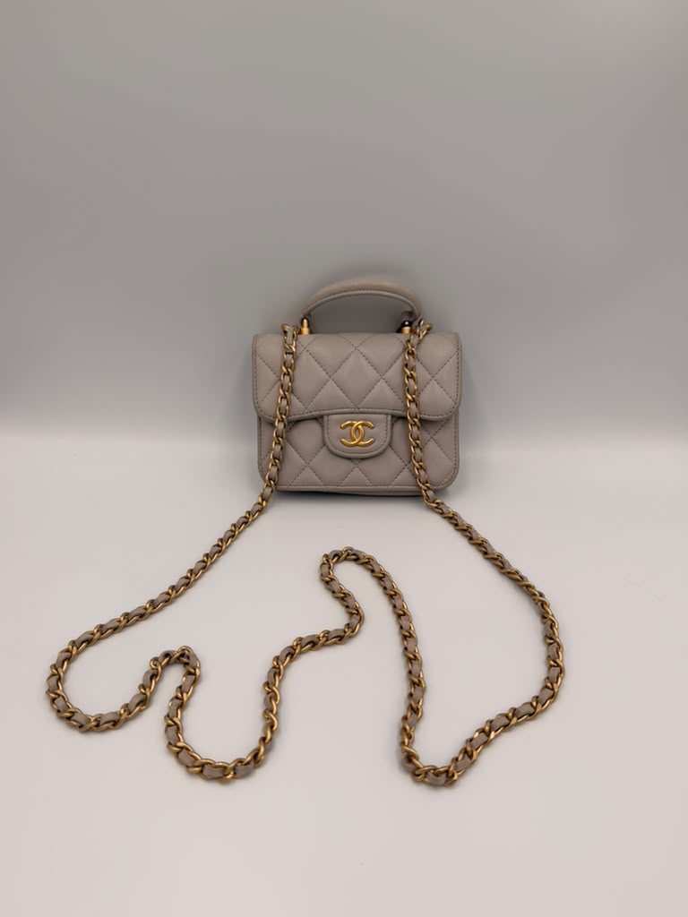 Chanel Mini Classic Flap with Top Handle — Light Blue Lambskin Aged Gold Hardware