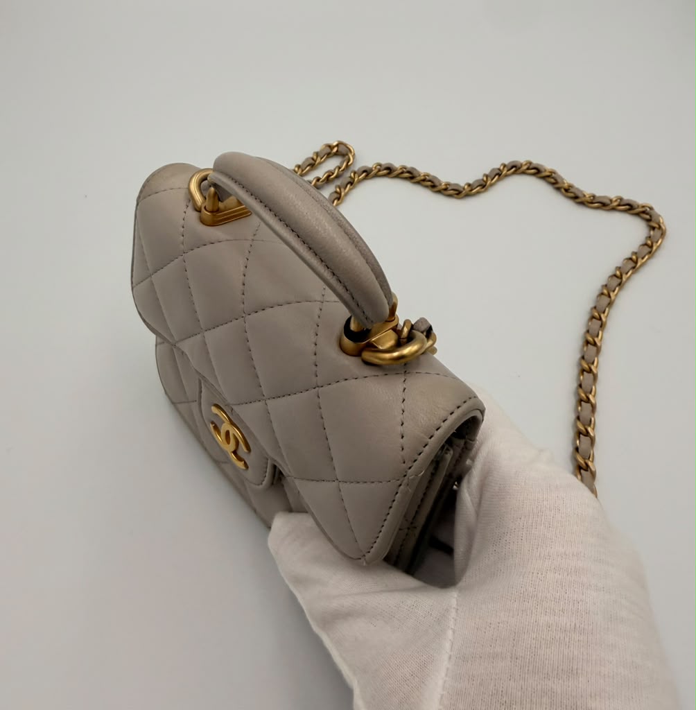 Chanel Mini Classic Flap with Top Handle — Light Blue Lambskin Aged Gold Hardware