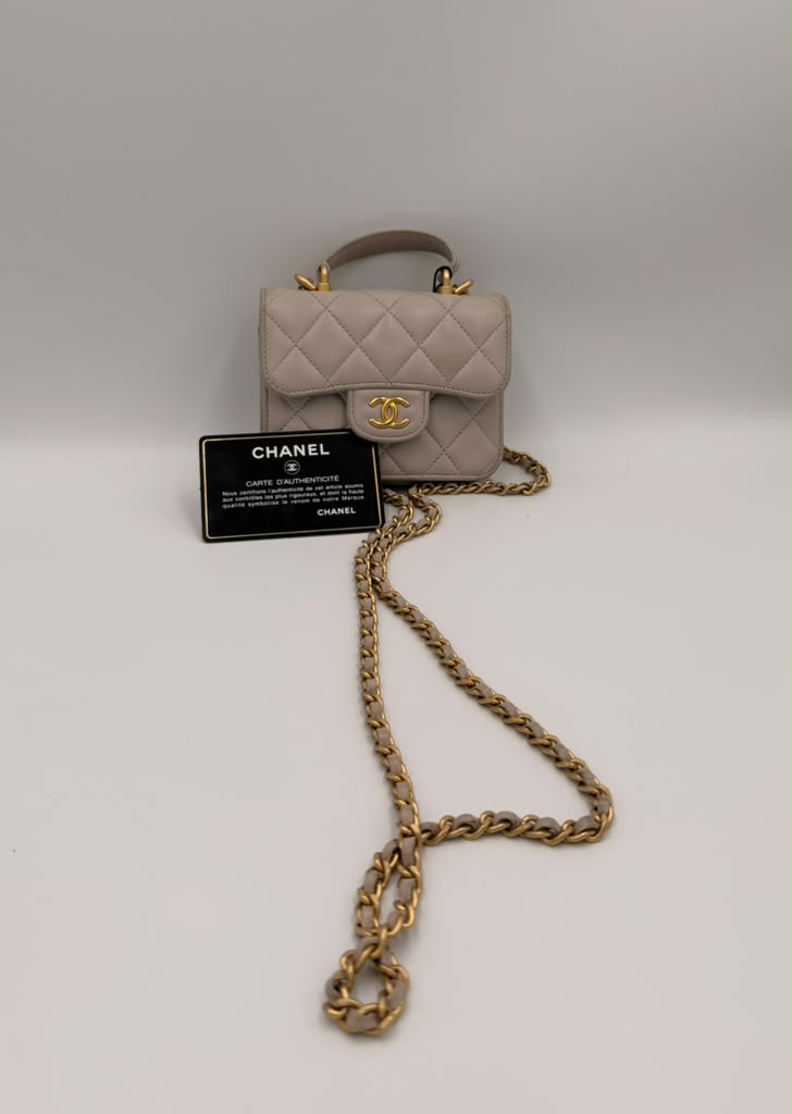 Chanel Mini Classic Flap with Top Handle — Light Blue Lambskin Aged Gold Hardware
