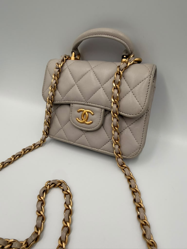 Chanel Mini Classic Flap with Top Handle — Light Blue Lambskin Aged Gold Hardware