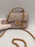 Chanel Mini Classic Flap with Top Handle — Light Blue Lambskin Aged Gold Hardware
