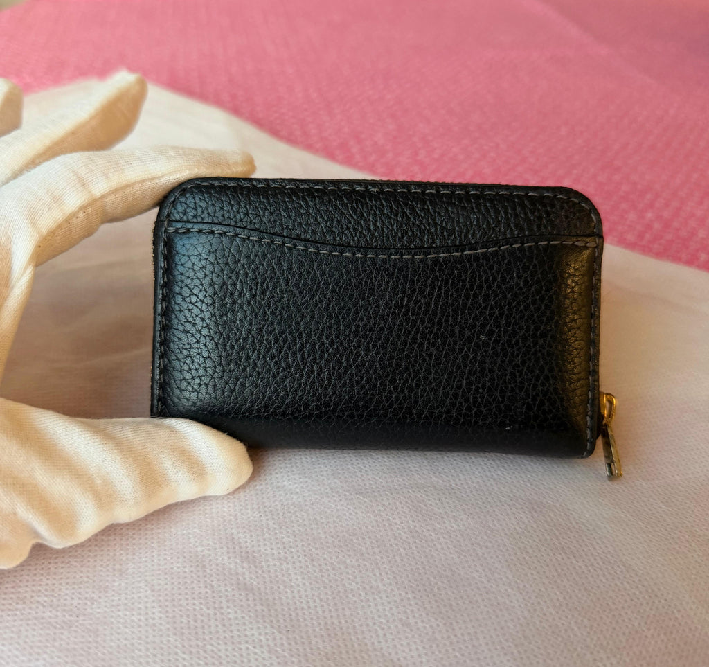 Coach small zip-around wallet black leather — interior view