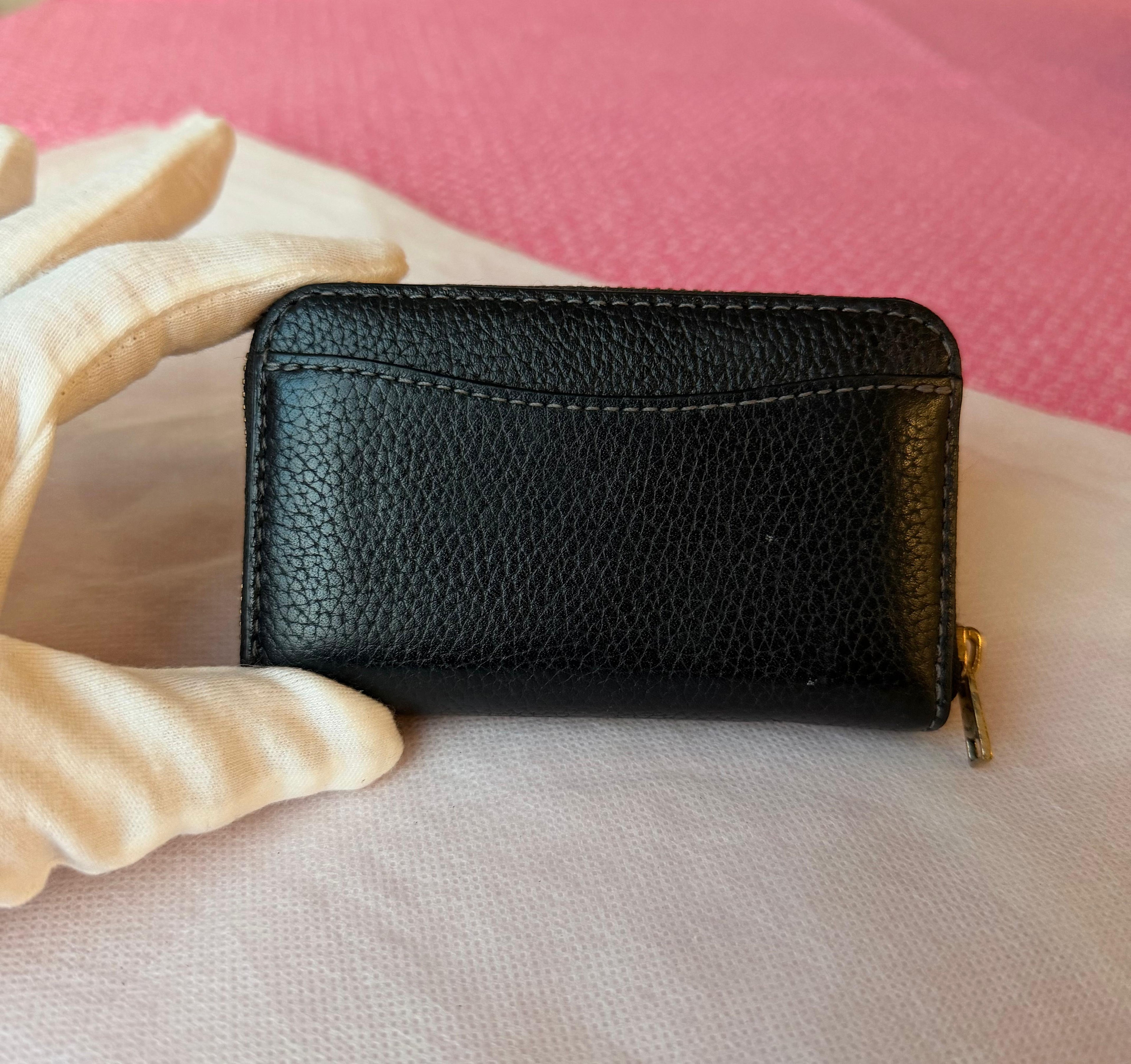 Coach small zip-around wallet black leather — interior view