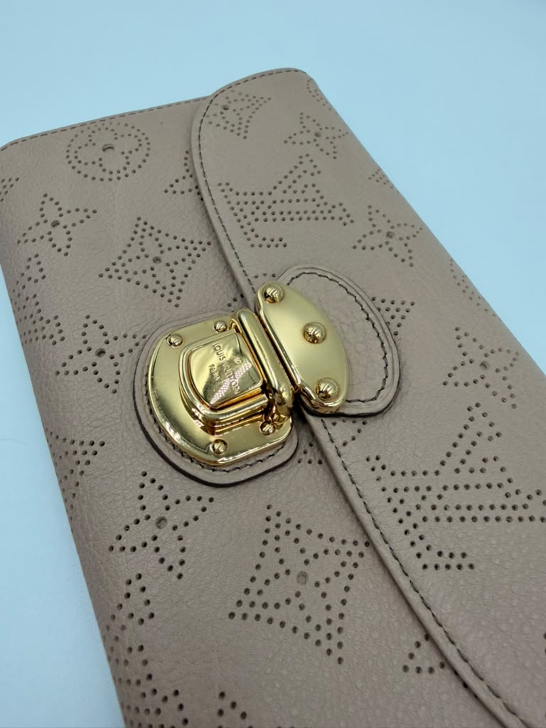 Louis Vuitton Mahina Amelia Wallet — Blush Pink Perforated Leather, Gold Hardware